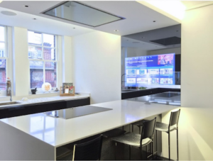 semi transparent mirror in contemporary kitchen JNS Glass & Coatings Colorado